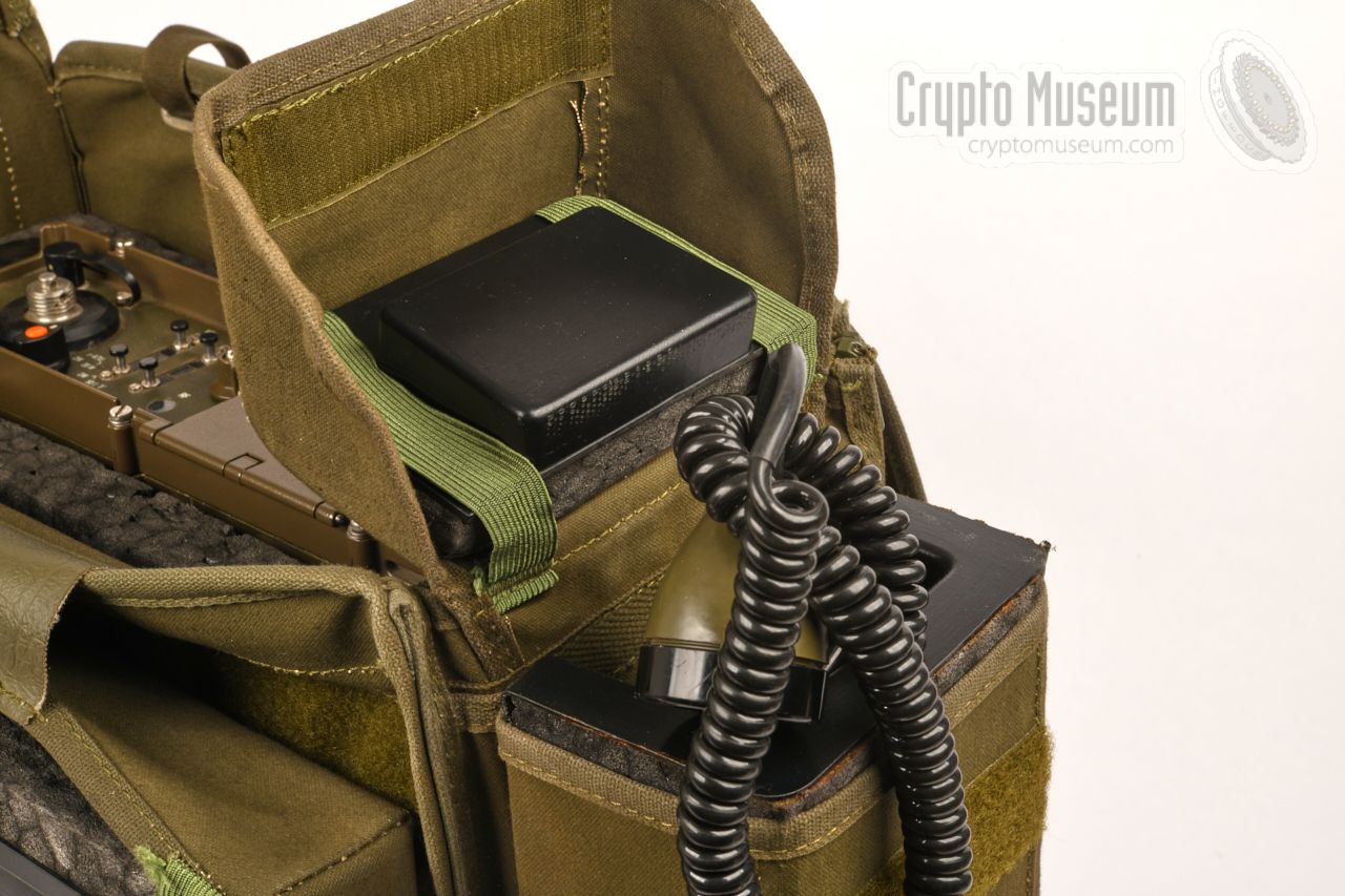 Handset stowed in a pocket of the carrying case