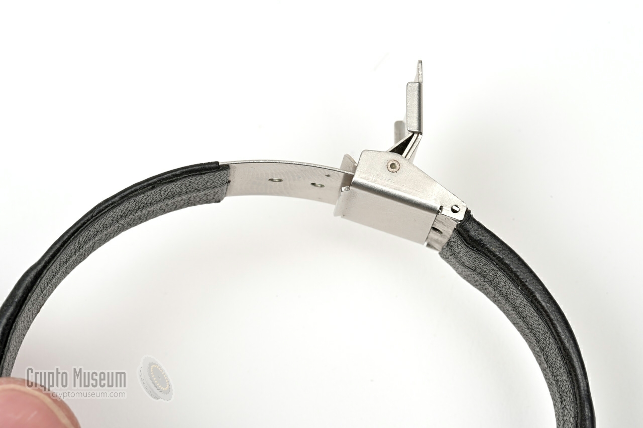 Leather covered metal bracelet with open lock