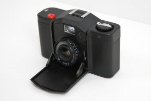 Minox 35A, ready for use (lens open)