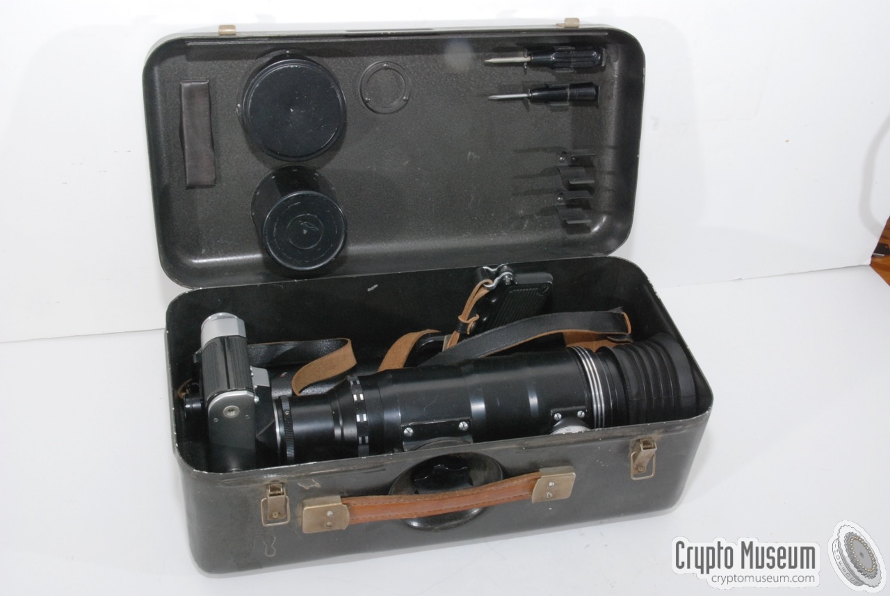The camera and the accessories stored inside the metal container.