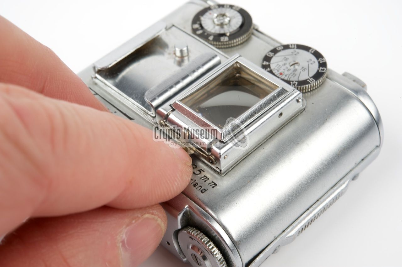 Opening the folding viewfinder