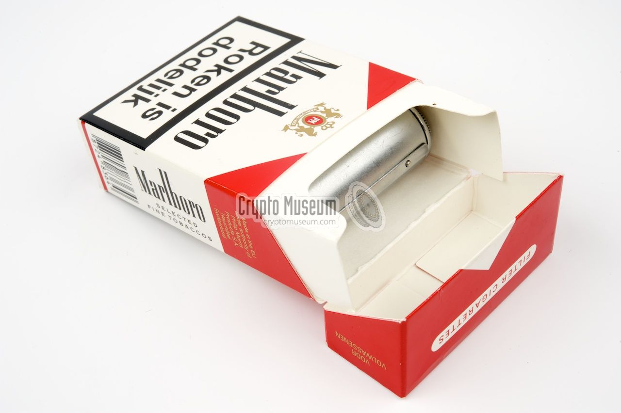 Barely visible inside the cigarette pack