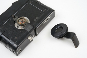 Camera and concealment nozzle