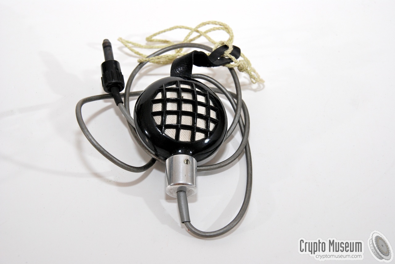 The 'standard' microphone supplied with the Mi-51. Attaches to clothing with a leather strap.