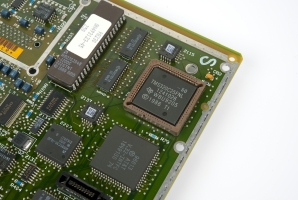 Close-up of some special components (DSP, V.32 interface and a large EPROM)