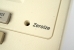 Zeroize button. Use a paperclip to press the recessed button.