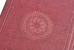 Emblem impressed in rear cover