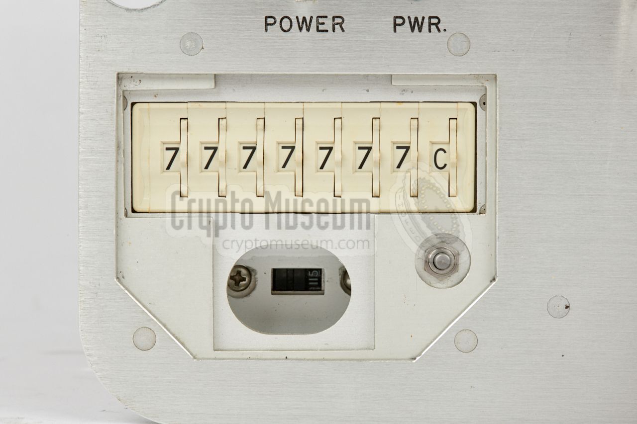 KEY-setting consisting of 7 digits (0-7) and one letter (A-C). Note the tamper switch at the bottom right.