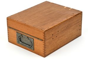 Wooden case with metal grip