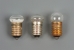 Three light bulbs with E10 fitting. The two on the left are flattened.