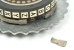 Broken locking arm (found inside case)