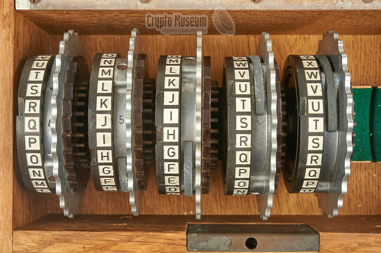 Wooden box with five Naval Enigma wheels