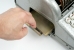 Opening the drawer of the card reader