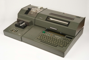 Complete Gretacoder 805 desktop system with paper tape reader/puncher on the left