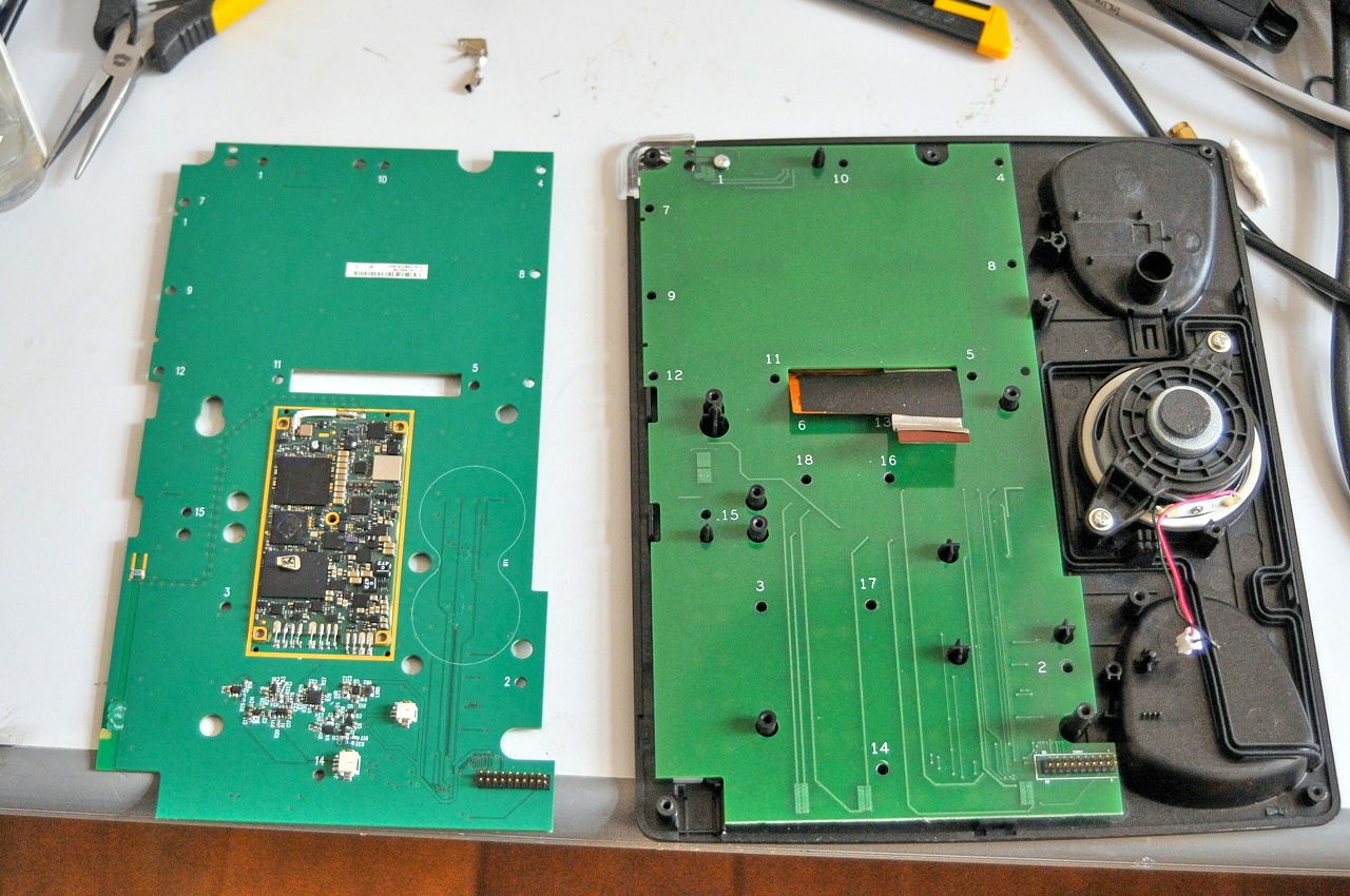 Replacement board aside an original keypad board (metal cover removed)