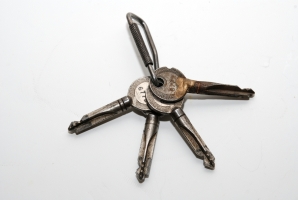 The four keys that were usually supplied with each machine: two operator's keys and two officer's keys.