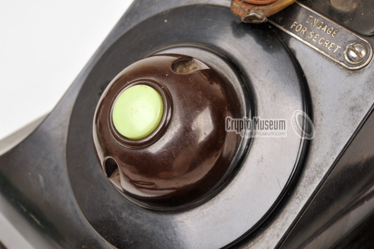 Bakelite doorbell knob mounted at the center