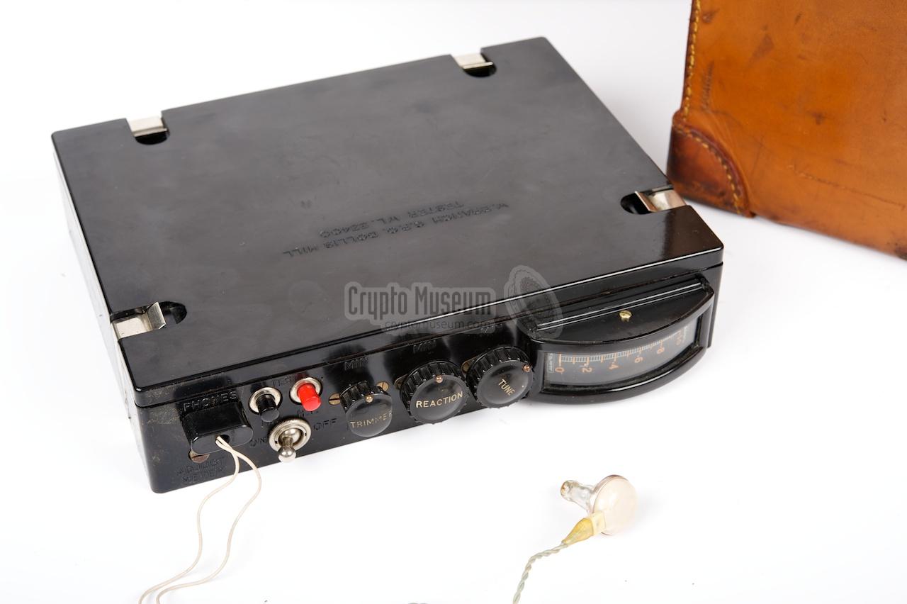 GPO receiver with earphone in front of leather case