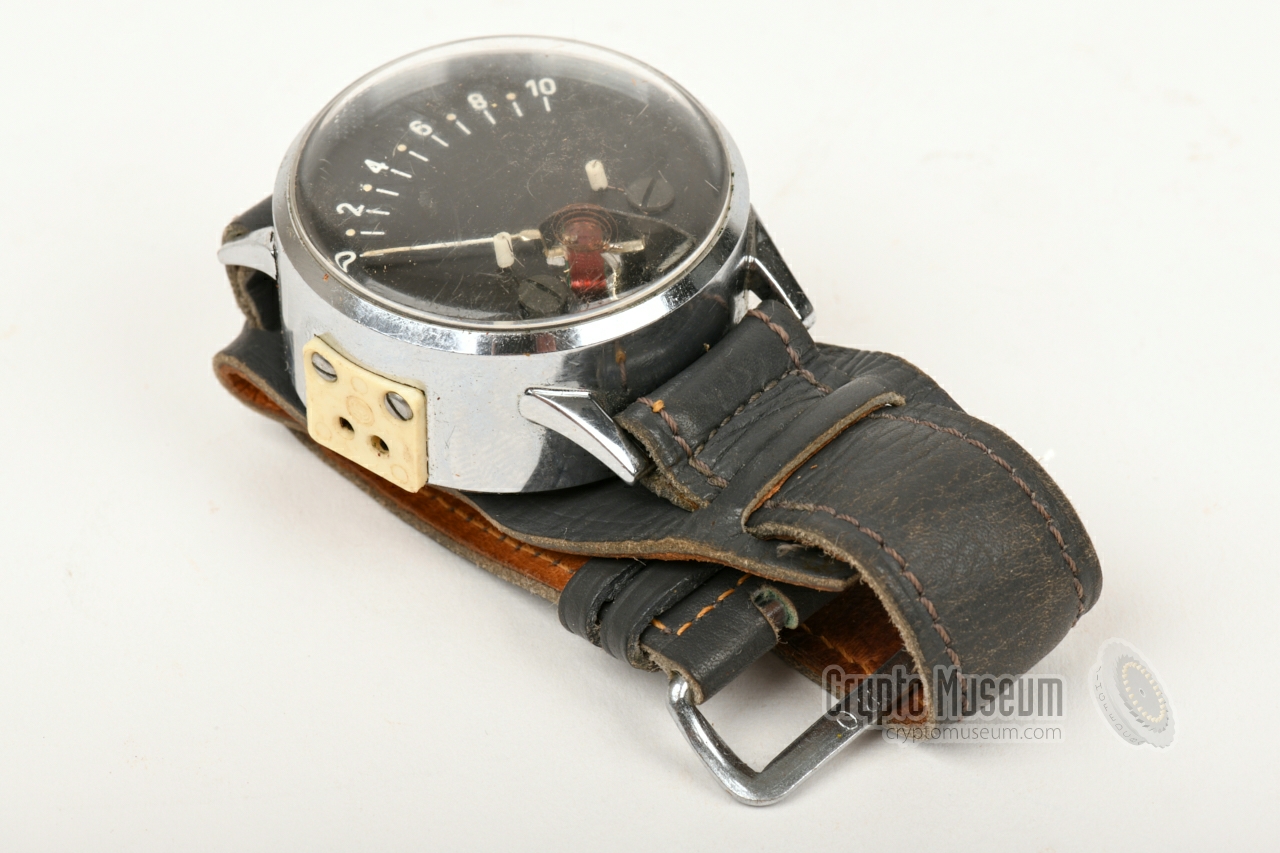 Field strength indicator disguised as wristwatch. Note the two-pin socket at the left side