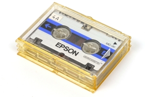 Microcassette in plastic storage box