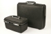 Large Samsonite suitcase with hacket Becker car telephone set, and smaller beauty case with external power supply unit.