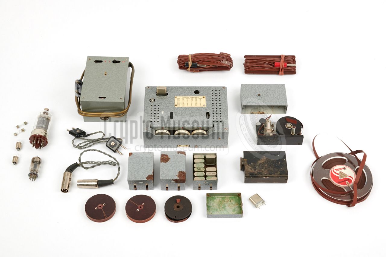 Contents of the two containers, with the transmitter at the center