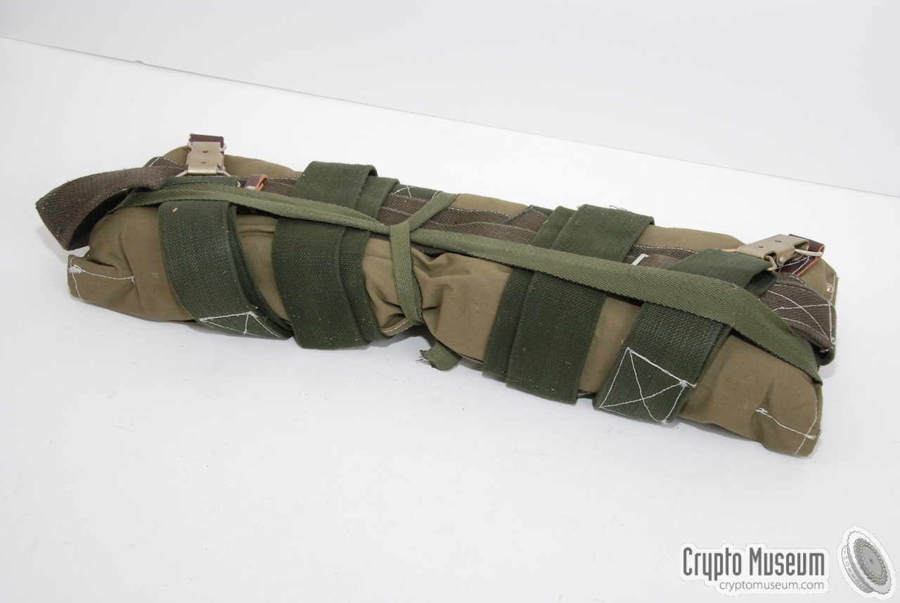 The battery belt as packed in the wooden transit case